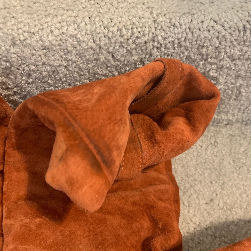 Burnt orange (copper) Suede UGG boots.